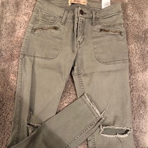 Hollister green ripped jeans